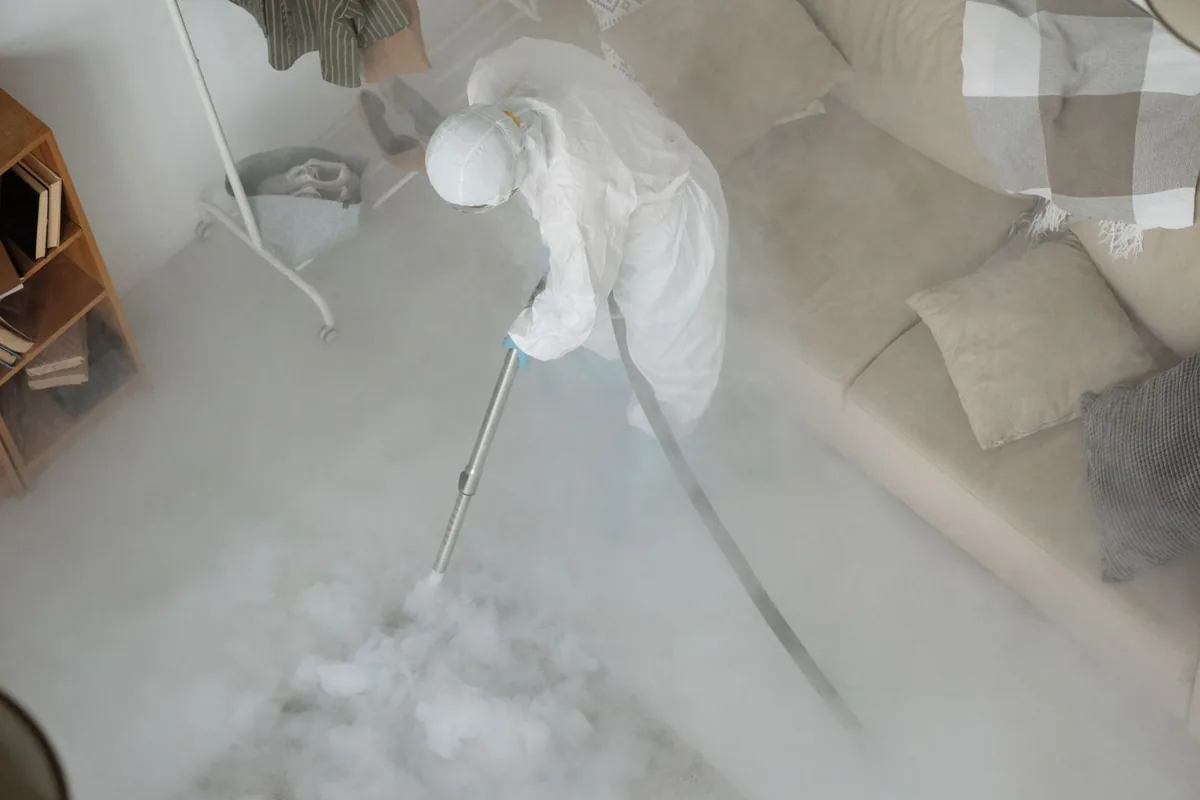 Biohazard cleanup technician in protective equipment, Bothell East, WA